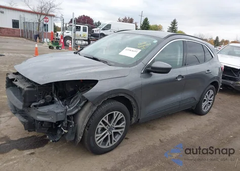 2021 Ford Escape Sel Hybrid z USA, uszkodzony, nr VIN 1FMCU9CZ3MUB24242